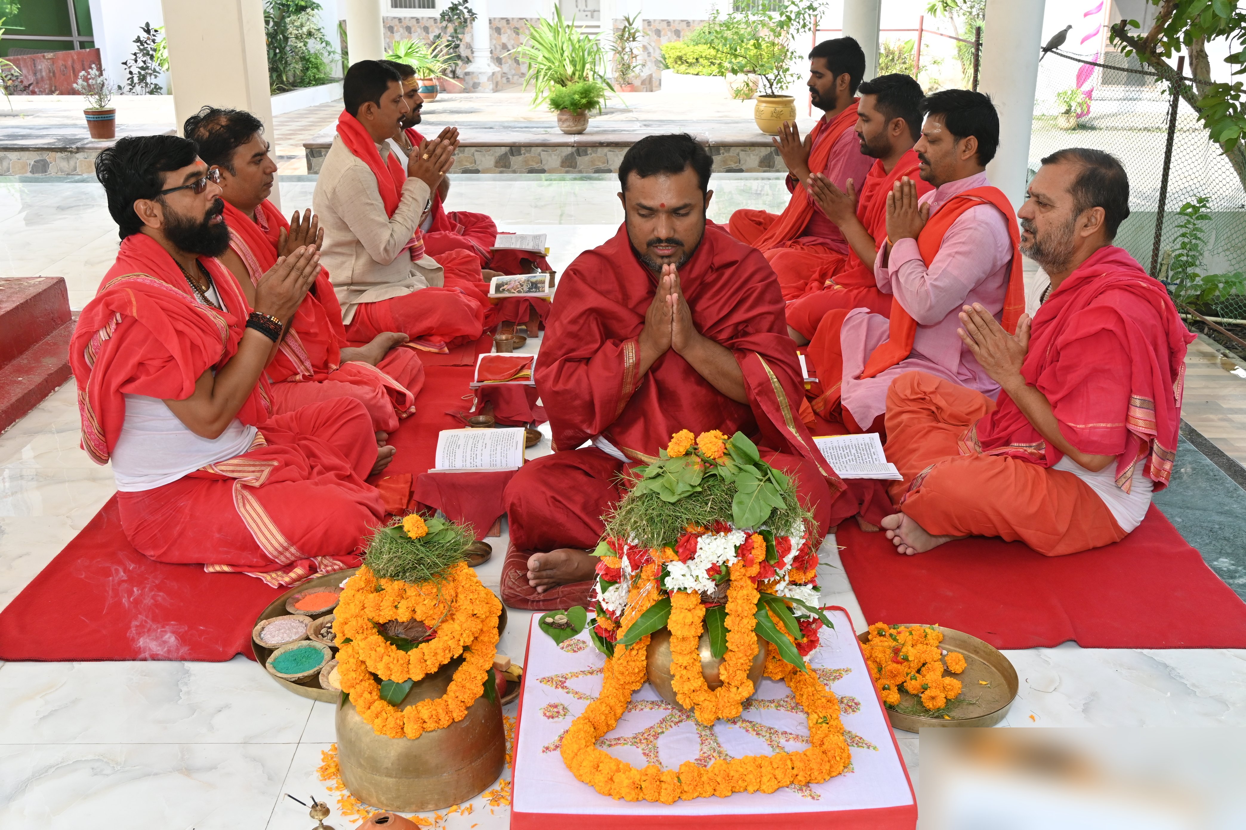 Priests worshipping the kalash during Navratri at the Vedic Blessings Foundation ashram in Varanasi